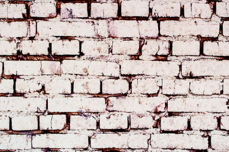 old torn white brick wall. texture