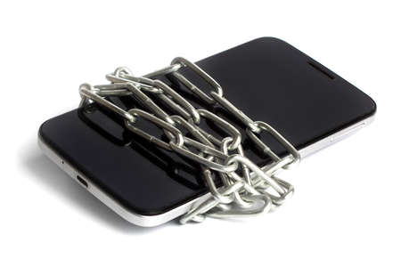 the phone is wrapped with chain on white backgroundの写真素材