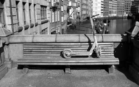 Resting e-scooter on benchの写真素材