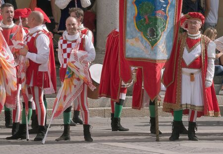 Participants of the National championship of the medieval flag bearers and musicians in Faenza,...