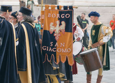 Participants of the National championship of the medieval flag bearers and musicians in Faenza,...