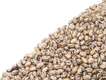 Mottled beans, laid out on the diagonal. On a white background.
