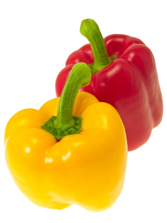 A pair of bell peppers. On a white background.の写真素材