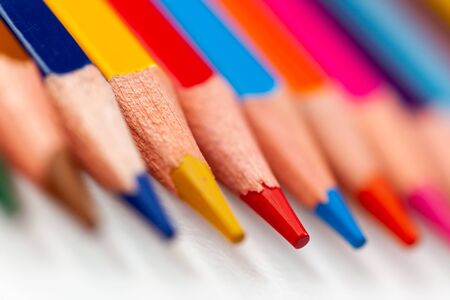 the tips of colored pencils on a white background, close-upの写真素材