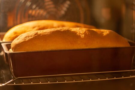 homemade bread is baked in the ovenの写真素材