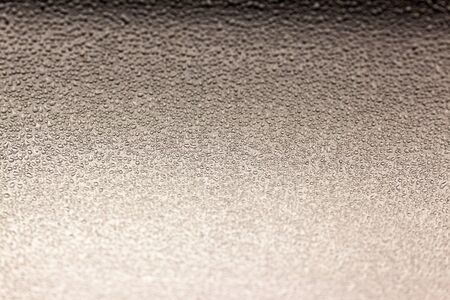 Drops of water on stainless steel close-up. Use as background or textureの写真素材