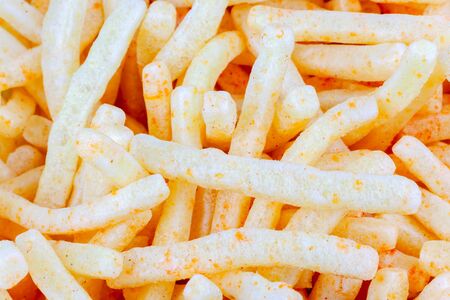 Potato chips close-up, use as texture or backgroundの写真素材