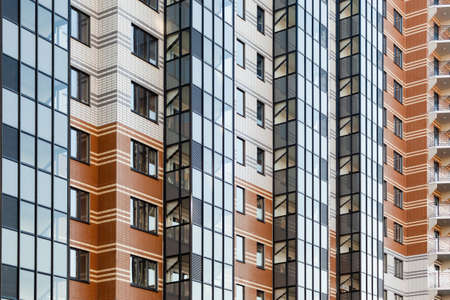 modern multi-family housing, residential building facade with aluminum windows
