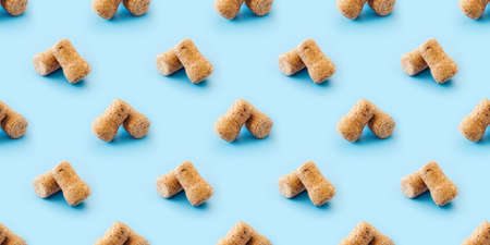 wine corks, seamless pattern with pastel blue background.  Minimalist natural luxury. Top view, flat lay.の写真素材