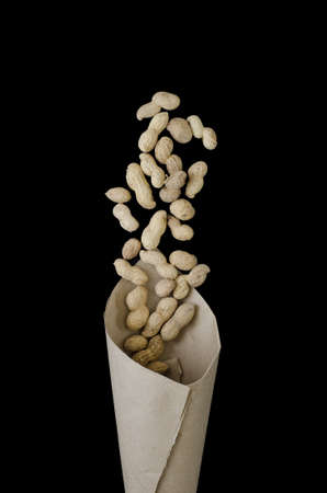 peanut in dark background. Cooking concept. Top view, flat lay, copy space.