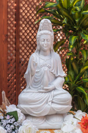 Guanyin  Bodhisattva statue in the lotus positionの写真素材