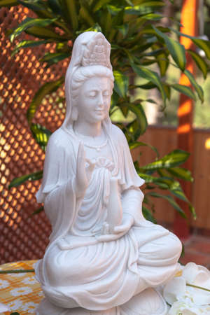 Guanyin  Bodhisattva statue in the lotus positionの写真素材