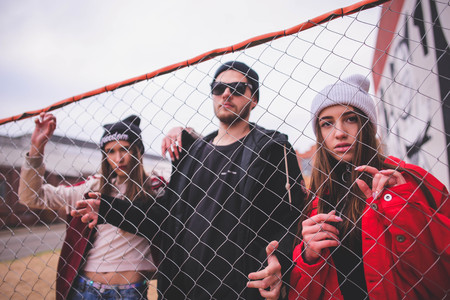 Group of young hipster friends in a urban backgroundの写真素材