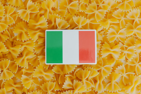 Farfalle and Italian flag. Italian cookeryの写真素材