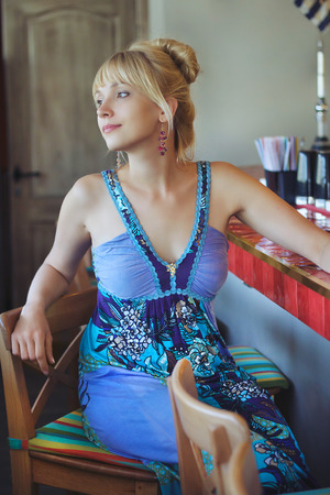 Portrait of a beautiful romantic girl in summer dressの写真素材