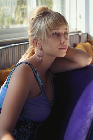 Portrait of a beautiful romantic girl in summer dressの写真素材