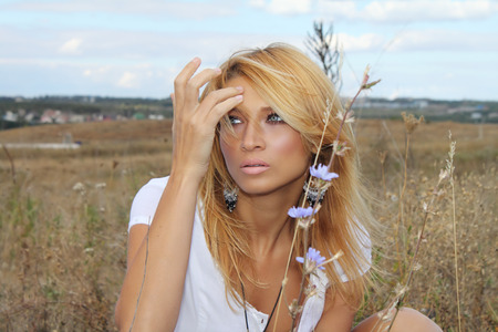 Portrait of a beautiful woman in natureの写真素材