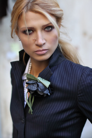 Portrait of a beautiful girl in jacketの写真素材