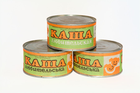 Three jars of canned porridge soviet times on a white backgroundのeditorial素材