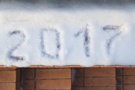 new year has come! 2017 is written on the white snowの写真素材