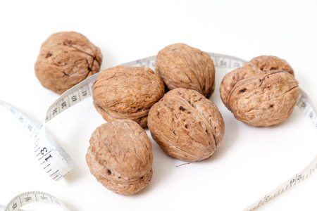 Several large walnuts isolated on white background.の写真素材