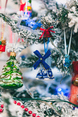 original Christmas tree toy is a porcelain windmill with blue blades weighing on a Christmas tree.
の写真素材
