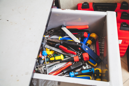 Retractable metal box with a variety of locksmith tools closeup
の写真素材