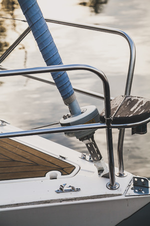 Handrails made of stainless steel on the bow of the yacht