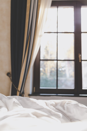 Autumn story. View from the bedroom to the autumn natureの写真素材