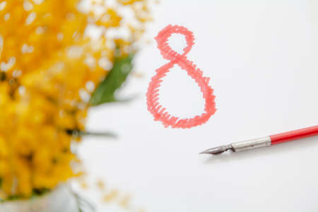 Eighth of March is a women's holiday. On a white background, a drawn number 8 in red. On the left is...