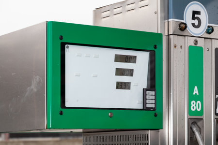 electronic scoreboard of the gasoline dispenser number five at a gas station. On small LCD screens...