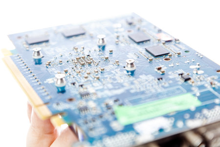 Video card for computer in hand on white background