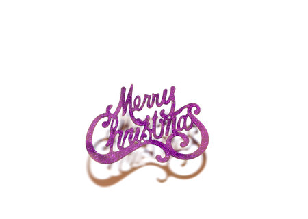 New Year design in retro style. Lilac inscription Merry Christmas on a white background close-up. In the background openwork shadowの写真素材