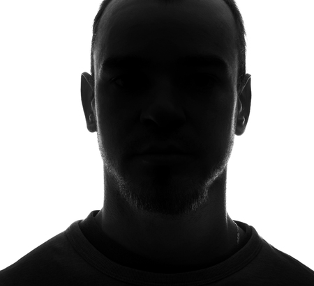 Unknown male silhouette  Back lit studio isolatedの写真素材