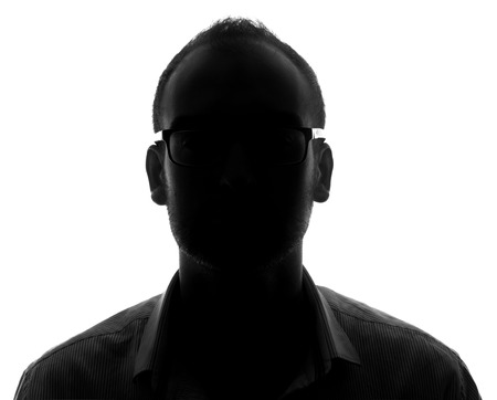 Unknown male silhouette  Back lit studio isolatedの写真素材