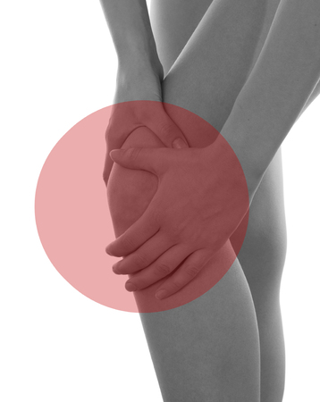 Pain concept Female knee Isolatedの写真素材