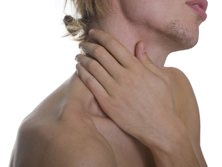 a man with a sore neckの写真素材