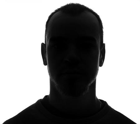 Unknown male silhouette  Back lit studio isolatedの写真素材