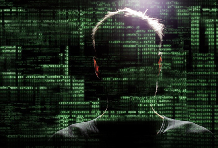 Silhouette of a hacker uses a command on graphic user interface の写真素材