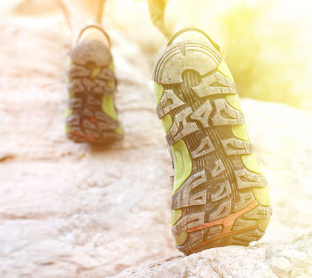 Trail runner, man in mountains. Running, sports, fitness and healthy lifestyle outdoors in summer natureの写真素材