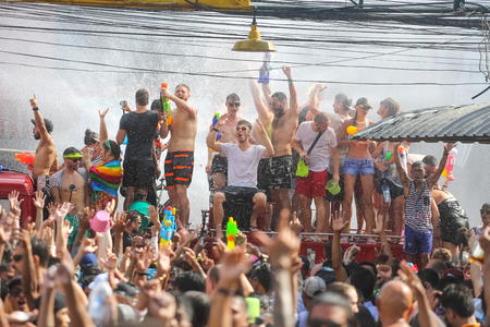 Koh Phangan island, Thailand - April 13 2017: Unidentified tourists shooting water on Songkran Festival ( Thai New Year ) at Thongsala streetsのeditorial素材
