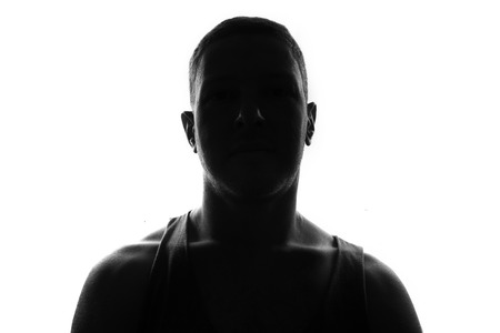 Male person silhouette over whiteの写真素材