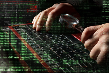 hacker hands at work with interface around