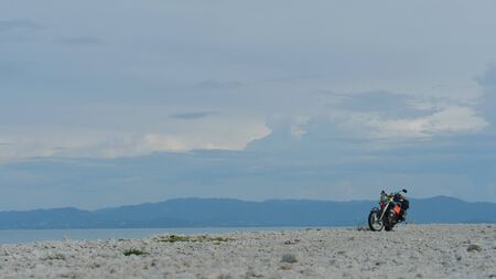 Freedom. Motor bike under sky ready to goの写真素材