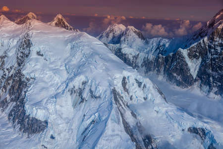 Aerial view of the most spectacular glaciers of Denali National Park, Mount McKinley touched by the morning light. Alaska, USA.の写真素材