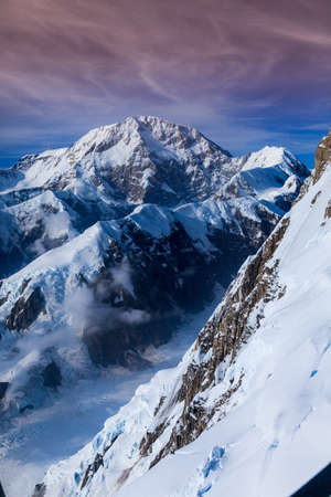 Higher than clouds - areal view of Mount McKinley glaciers, Alaskaの写真素材