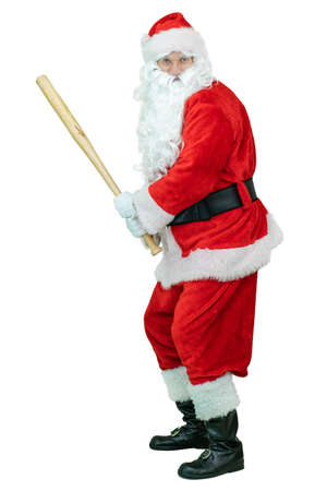 Santa holds, swings baseball bat. Santa Claus is playing baseball bat on white background. Christmas comingの写真素材