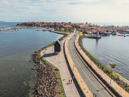 Windmill at the entrance to the ancient city of Nessebar. Travel to Bulgaria. Aerial view