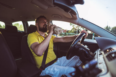 Drunk Driving in Action. Realistic Scene Behind the Wheel