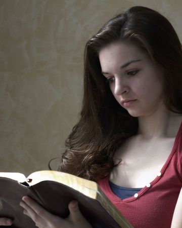 teen reading bibleの写真素材
